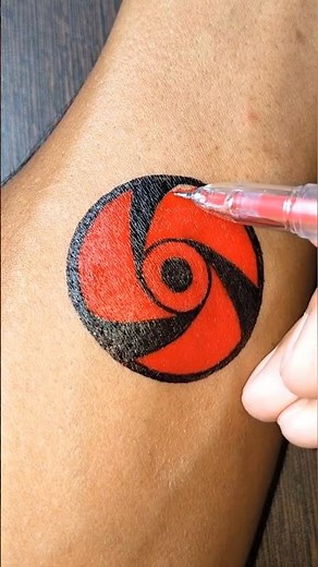 DIY Rai's Mangekyō Sharingan tattoo design with gel pen for Anime fans