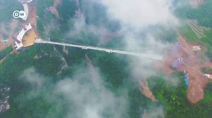 Would you dare to cross the world's highest and longest suspension bridge? | DW News