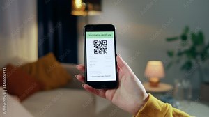 Woman showing vaccination passport on phone, covid qr code close-up, international coronavirus vaccine certificate on mobile device, green zone. High quality 4k footage Stock Video