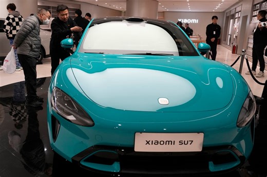Watch as Chinese tech company Xiaomi launches highly anticipated electric vehicle