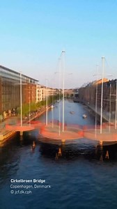Cirkelbroen Bridge, completed in 2015 by Studio Olafur Eliasson, is a pedestrian bridge spanning the Christianshavn canal in Copenhagen. Composed of five circular platforms connected in sequence, the bridge departs from linear crossing in favor of a staggered path that alters pace and movement. The geometry references maritime structures while introducing pauses and shifts in direction, framing views of the canal and surrounding harbor. Rather than prioritizing efficiency alone, the bridge opera