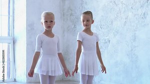 Young teen girls perform ballet . A choreographed dance of a group of graceful pretty young ballerinas practicing on stage in a classical ballet school Stock Video