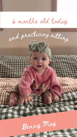 Ashley Stock on Instagram: "Benny May is 6 months old already! Daddy’s girl, Grandma’s bestie, Mama’s mini. Loves to chew on her toys, especially little taggies. Teething for sure (will she have a gap in her teeth like her big sis and bro?). Always smiling. Very VERY energetic. Early stages of crawling, level expert. Sitting unassisted, level novice. Loves an audience. Only naps while being held. Obsessed with the pups. Currently in a sleep regression and mama and daddy are feeling it. About 13.