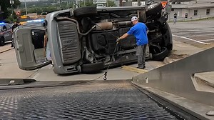 Car Flips Over After Hitting Telephone Pole