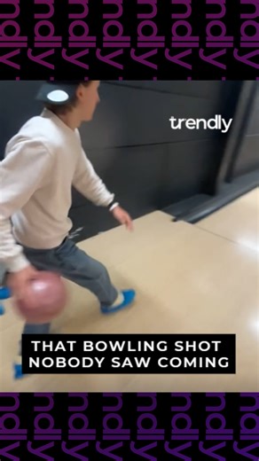 Bowling throw ascends and hits overhead screen