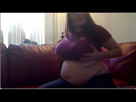 BBW MILF stuffs her belly