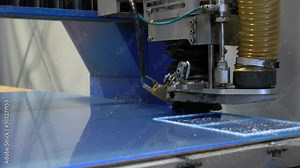 Milling cutter cuts plastic part on robotized production line. Factory robots used to produce precise an strict product on automation conveyor lines. Stock Video