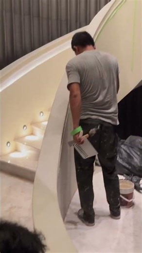 The process of making stairs in a big house done by builders