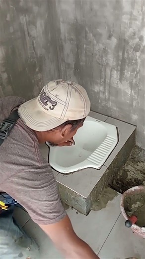 Installing tile near squat toilet