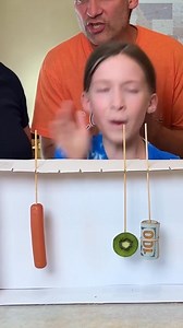 3.1M views · 10K reactions | Hot Sauce Fountain Game 藍 Dad and kids play funny family game in their kitchen where they randomly grab different foods like donuts, cookies, fruit, and broccoli and then dip them in a fountain of hot sauce. There is also a random special cash prize for one of the family members.  This video was produced by Network Media and Benson Bros | Play Together Stay Together | Facebook