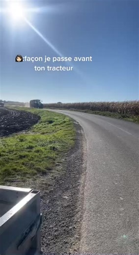 Modern Heavy-Duty Tractor Driving on Rural Road