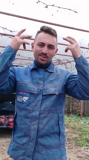 Blue Work Jacket for Manual Work: Sign Language Demonstration