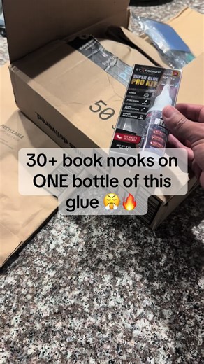 This is the glue. The only glue. Starbond medium super glue pro kit — 2 ounce bottle, precision tips, needle nose applicators for those tight detailed placements that can make or break a build. This exact bottle has carried this channel through over 30 book nook kits and it is still going strong. If there is one non-kit purchase that every builder at any level needs in their setup it is this one. No mess. No stringing. Cures fast. Holds forever. The product link is in this video — go grab it and