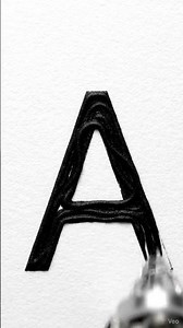 A Machine Drawing a Perfect Letter A