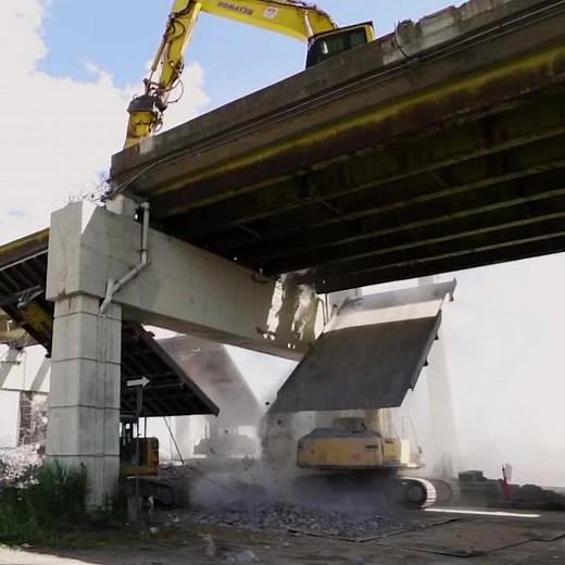 Gardiner Expresswat Easbound Ramp Demolition - Deflector Shields help to ensure debris lands in the drop zone. #demolition #demo #heavyequipment.