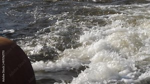 dirty waste water flows from a pipe into a river polluting and poisoning fresh water, industrial waste, industrial water is discharged into a reservoir, problems of ecology and fresh water