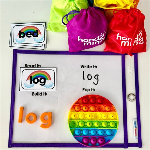 Celebrate St. Patrick’s Day with a lucky literacy center activity! ☘️ Little leprechauns will have so much fun practicing CVC words in a colorful, multimodal way! ❤️ Read the word card 🧡 Write the CVC word on the mat 💛 Build the word with Rainbow Lowercase Magnetic Letters 💚 Pop the words on an Alphabet Sensory Bubble Popper 💙 Repeat! Drop a 🌈 in the comments for a link to the worksheet, word cards, and list of the hands-on materials used in this technicolor activity! | Hand2mind