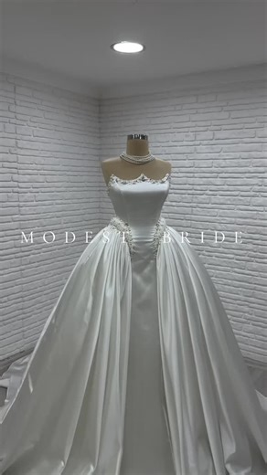 𝐌𝐨𝐝𝐞𝐬𝐭 𝐁𝐫𝐢𝐝𝐞 on Instagram: "Satin & pearls 🤍✨🫶🏼 • #weddingdress #weddingdressshopping #weddinggown #weddinghijab #ballgownweddingdress #hijabiweddingdress #modestbride #muslimownedbusiness #torontobride #londonontariophotographer #sewing #londonontariobridal #torontowedding #ottawawedding #windsorwedding #ottawa #custommadeweddingdress #sewing #canadianmade #canadianowned #bridetobe #modestweddingdress #behindthescenes #custommadedress #modest wedding dress #bridetobe #bride #brida