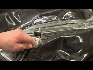 Replacing a double valve on a pvc inflatable suit
