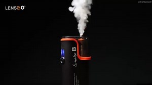 Magical shots Part ① with the Smoke B fog machine Lensgo microphone ✍【Smart Phone Size】Special smoke b is a permanently installed battery with compact design 🎩【Flexible Use】Can be used both indoors and outdoors for model、food、device、beauty 😎【Easy to set Up】2 Press to active and wide range of function Do you want to learn more ,wait for next video.😜 #videos #photo #FilmWithStyle #FilmmakingGear #filmmaker | Lensgotech