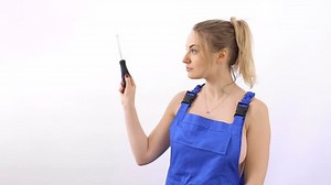 Young Beautiful Caucasian Girl Overalls Screwdriver Stock Footage Video (100% Royalty-free) 1006950505 | Shutterstock