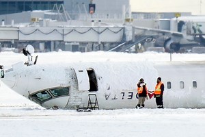 Why did Delta plane crash, burst into flames and flip over? Inquiries begin