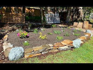 How to build a rock wall and raised bed