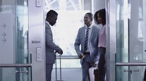 Business people getting in the elevator at modern office 4k | Free Stock Video Footage