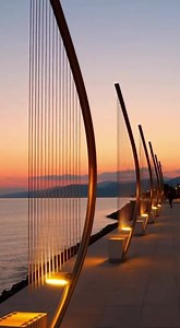 Greece has begun installing innovative wind harp structures that transform natural wind into both music and clean electricity, blending renewable energy with public art. Inspired by ancient Aeolian harps, these installations vibrate with the breeze to produce soothing tones while simultaneously generating power for nearby streetlights. Designed for coastal and windy urban areas, the wind harps enhance public spaces without visual clutter or noise pollution. Unlike conventional wind turbines, the