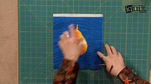Learn how to finish an art quilt with an easy pillowcase back while hiding the back of the quilted piece. You'll learn much more from Leni Wiener in her iquilt.com online class, Translate Photos to Fabric Art at https://www.iquilt.com/course/translate-photos-into-fabric-art. 25% Off Limited Time Offer | American Quilter's Society
