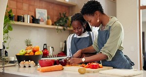 Home, cooking and black family with mother, girl and love with food, bonding together and lunch. Parent, mama or kid with ingredients, learning or teaching with childhood development, kitchen or meal