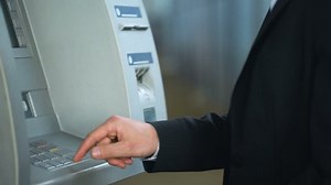 clip-1012300307-client-annoyed-atm-work-card-got-stuck