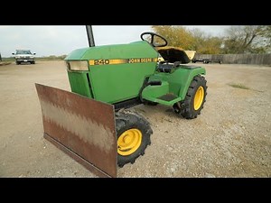 Adding a blade to the front of our John Deere mower