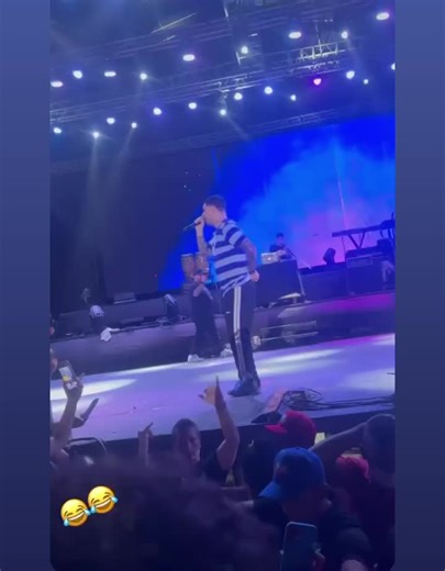 Live Concert Performance with Energetic Male Singer