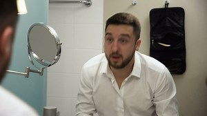 Businessman getting ready in the bathroom  - Free Stock Video