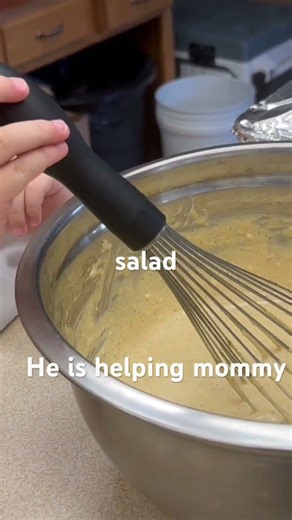 He’s mixing salad dressing