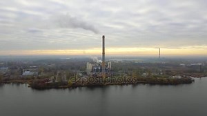 Garbage incineration plant. Waste incinerator plant with smoking smokestack. The problem of environmental pollution by factories.