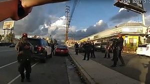 BWC footage shows man run at officer with hatchet before OIS