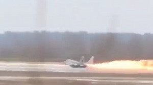 Video: Moment fighter jet bursts into flames forcing pilot to eject