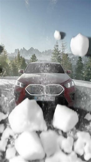 Clearing the snow off your BMW is 💯 satisfaction The BMW iX2 xDrive30 #bmwix2#shorts #bmwelectric