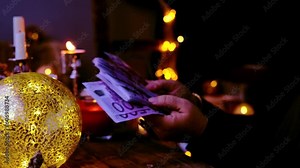 crystal ball, defocused esoteric Oracle, soothsayer tells fortunes to the client, answer questions, old magic table, candles are burning, incense is being smoked, magic to increase income Stock-Video