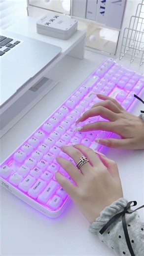 Upgrade your workspace with this sleek all-white tri-mode keyboard!