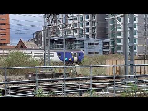 Northern Class 156 coupled to Class 150 at Manchester Victoria Railway Station