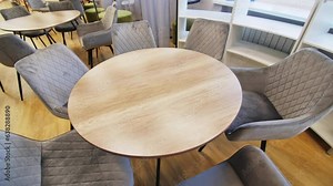 Round discussion tables for team works in school auditorium. Classroom for students collaboration and teambuilding concept at school