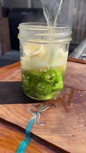 This loaded hot dog was grilled on the Primo, so you know that flavor is next level. Video credit: @chefqsoto on instagram | Primo Ceramic Grills