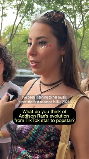 Impact on Instagram: "We caught up with fans before and after Addison Rae’s intimate NYC @spotify show at The Box on Thursday to get their thoughts on her metamorphosis from TikTok star to pop star. 🧜‍♀️ Our editor @ashleybarriientos stopped by to get takes from her glittery, gem-stickered fans who shared what they think about the star’s evolution and takeover of the pop music realm. 🌠 #AddisonRae #Addison #Spotify"