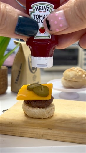 104K views · 1.7K reactions | Miniature Classic Cheeseburger with tomato sauce, gherkin, cheese and a seeded bun - yum #sauce #cheese #miniature #cheeseburger | My Mini Bakes | Facebook