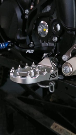 Flo Motorsports Lowering Pegs are #1 choice for Supercross rider @enzolopes and Hardenduro rider @quinn_wentzel. - Flo Motorsports lowering footpegs improve ergonomics and control by creating a more relaxed riding position, which can reduce fatigue and strain on knees, hips, and back, especially for taller riders. They also offer a wider platform and better grip than stock pegs. #FloMotorsports #FootPegs ☝️ | FLO Motorsports
