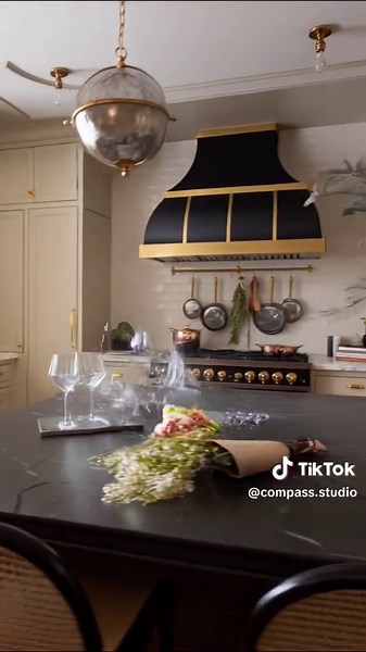 Watch this kitchen wash away the old and rebuild into something stunning. From tired and dated to bold and breathtaking… we completely reimagined this space from the inside out. Walls moved, structure rethought, and every finish curated with intention. #KitchenRemodel #KitchenDesign #BeforeAndAfter #InteriorDesign #DesignBuild #HomeRenovation #CustomCabinetry #ClevelandDesign #RenovationInspiration #CompassStudio #DreamKitchen #LuxuryRenovation