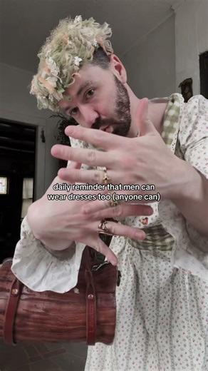 men wearing dresses